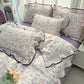 Juego de ropa de cama con ribete ondulado fresco
