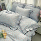 Juego de ropa de cama con ribete ondulado fresco