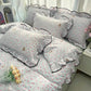 Juego de ropa de cama con ribete ondulado fresco