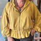 Chaqueta elegante con cremallera y capucha con volante en el bajo